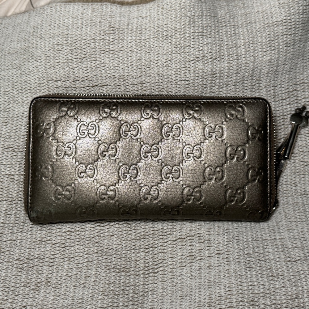 Authentic Gucci Embossed Metallic Leather Zip Around Wallet